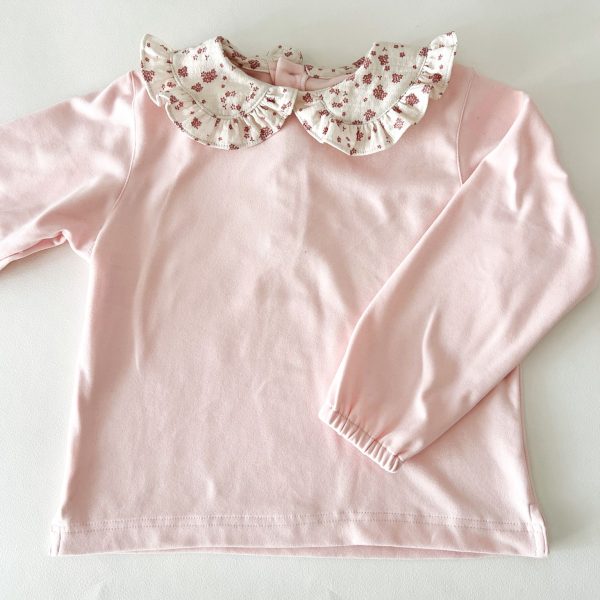 Buzo cuellito rosa